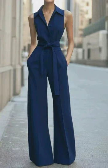 Comfortable women's wide leg sleeveless jumpsuit featuring a stylish tie waist, a perfect one-piece for summer.