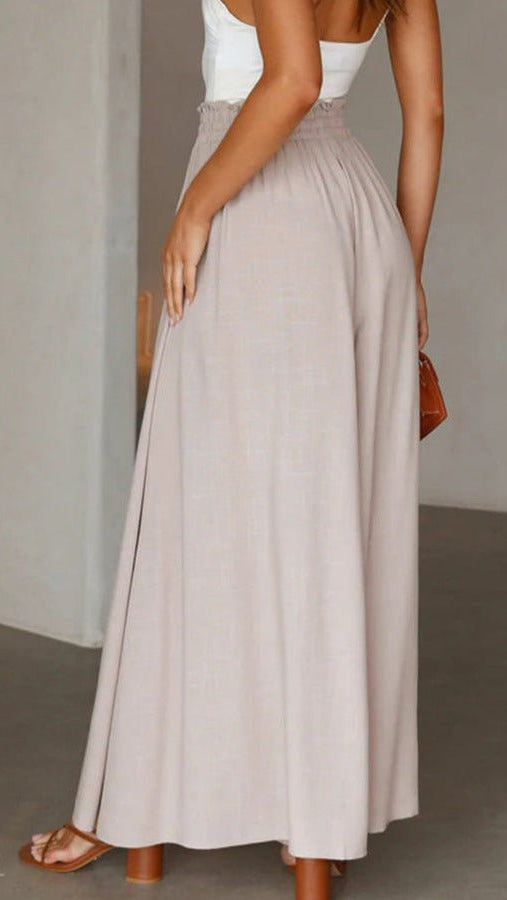 Modern essential women's wide-leg trousers with comfortable elastic waist for versatile styling.