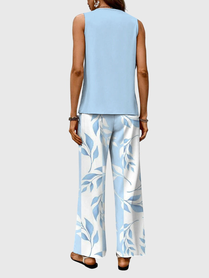 Sleeveless top and wide leg palazzo pants in a comfortable women's two-piece set, great for stylish summer looks.