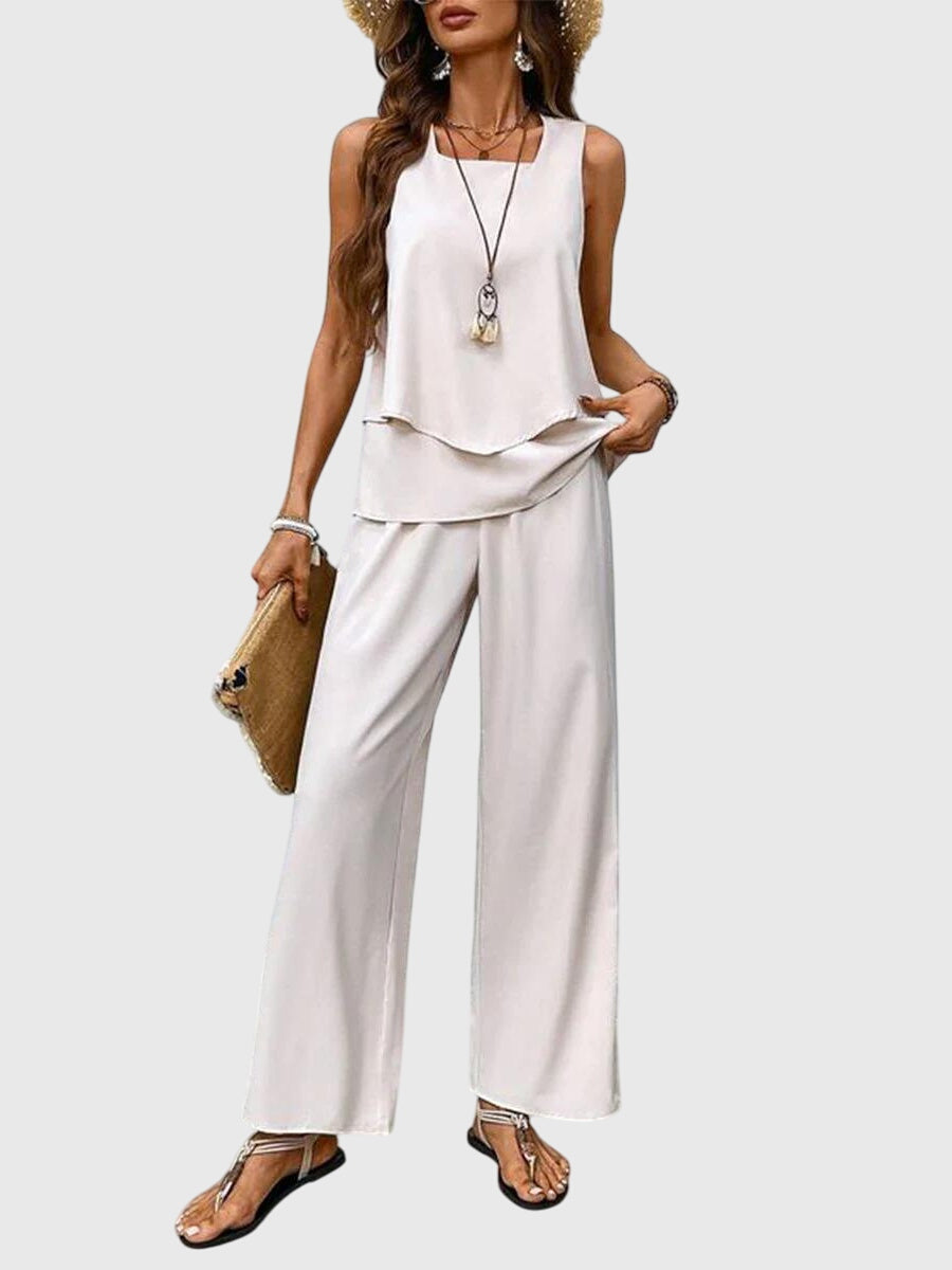 Trendy women's wide leg two-piece set, featuring a sleeveless top & flowing palazzo pants for summer style.