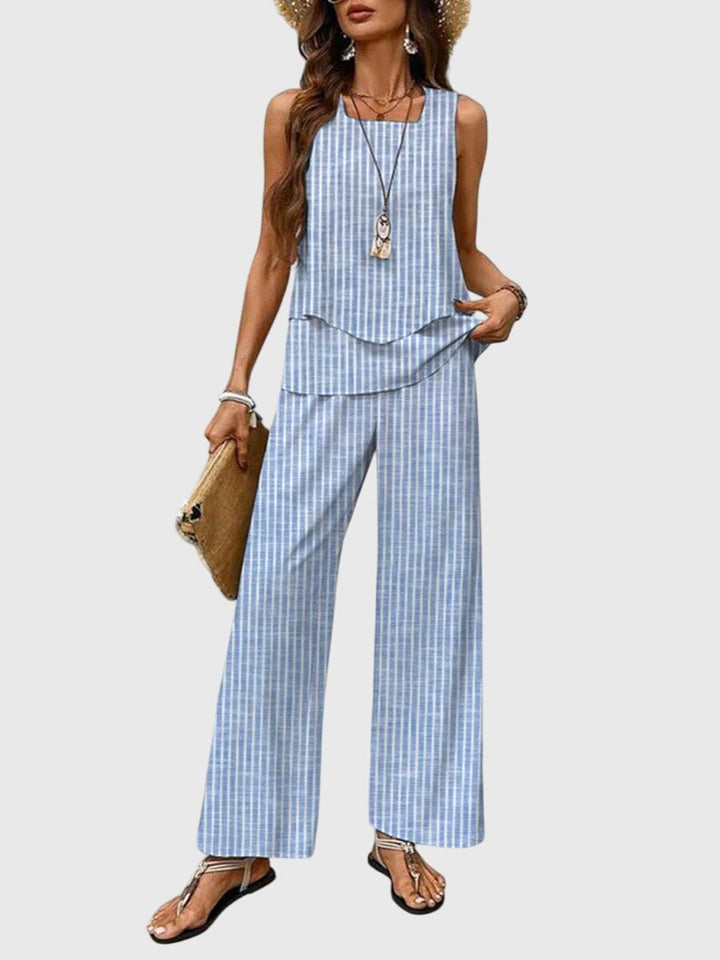 Relaxed fit women's wide leg two-piece set with soft sleeveless top & palazzo pants for ultimate summer comfort.