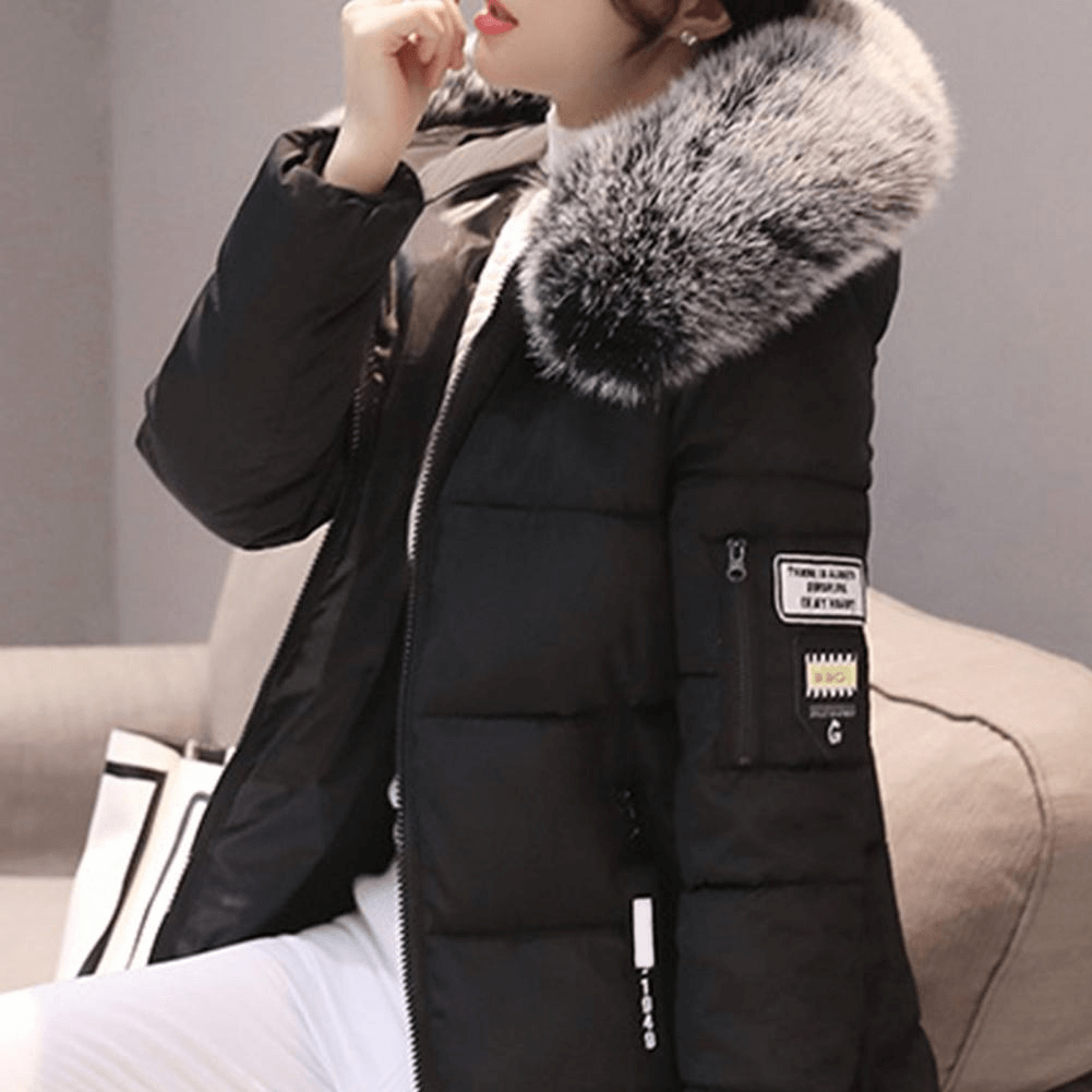 Women's insulated windproof puffer coat. Hooded warm outerwear, a perfect stylish jacket for chilly winter days.