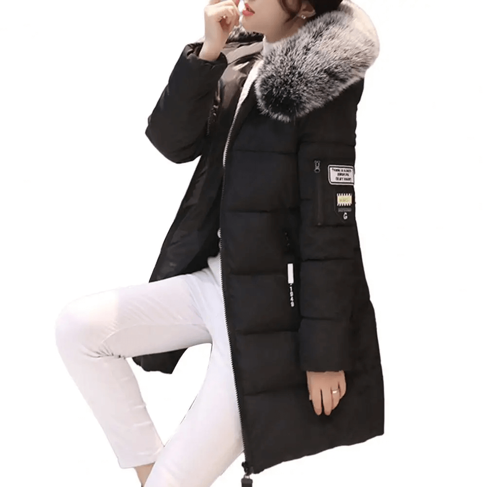 Texture close-up of women's puffer coat. Windproof & warm hooded winter jacket for stylish cold weather comfort.