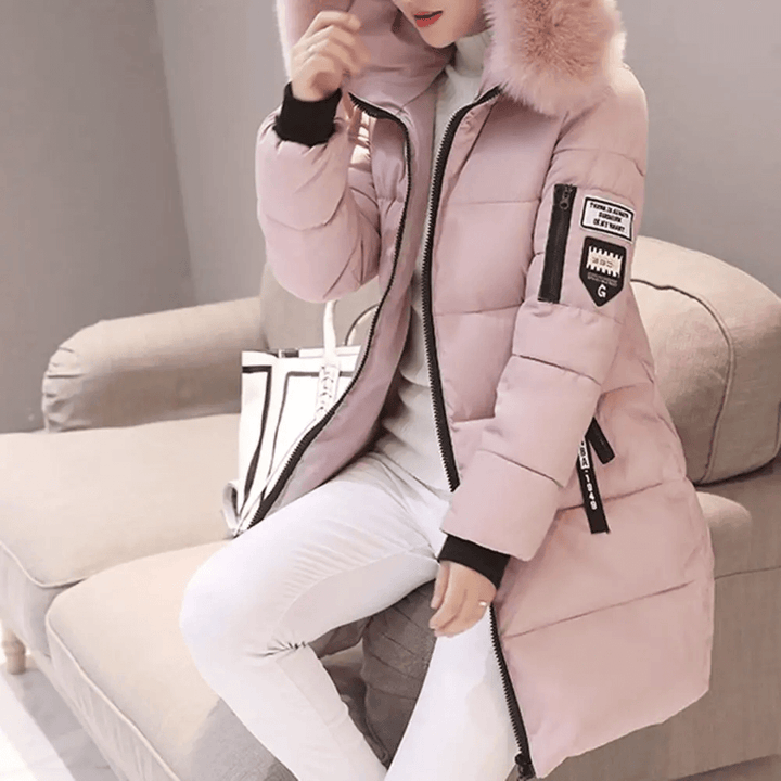 Stylish women's mid-length puffer coat. Windproof winter jacket with hood, ideal warm outerwear for cold days.