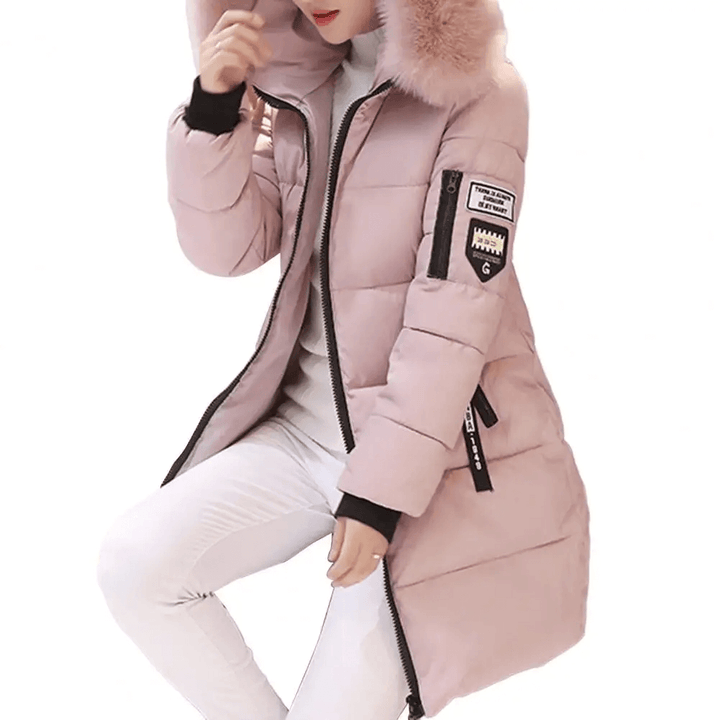 Detail of women's hooded puffer jacket. Windproof winter coat, designed for ultimate warmth & stylish comfort.