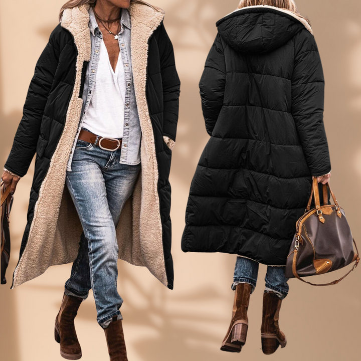 Stylish women's warm winter coat with hood, insulated for ultimate protection against wind and water.