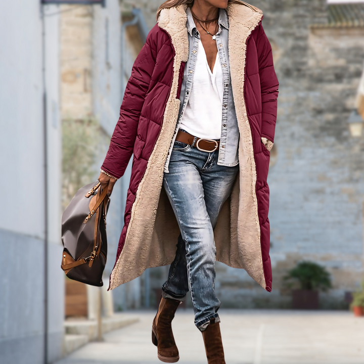 Warm women's winter coat, ideal for outdoor wear. Waterproof & windproof protection ensures ultimate comfort.