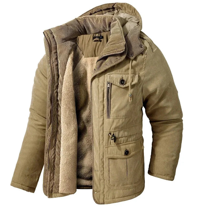 Women's winter utility field jacket, waterproof & breathable, with a detachable hood for cold weather protection.