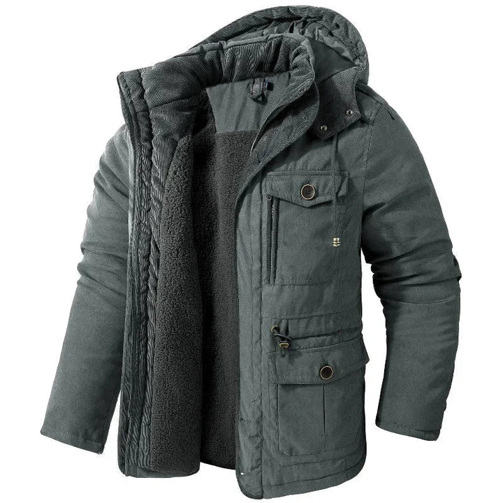 Warm women's utility field jacket for winter fashion. Features a stylish design and a functional detachable hood.