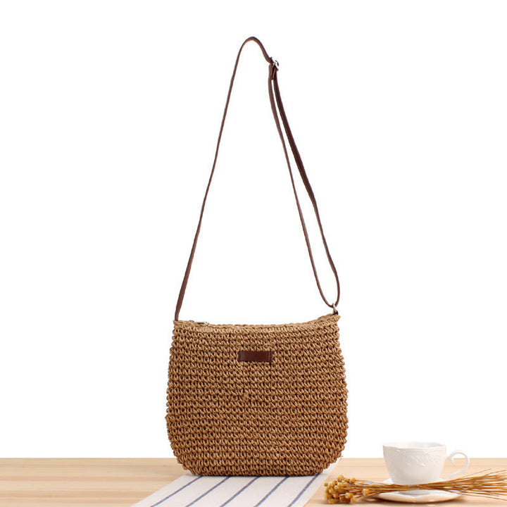Chic beige woven shoulder bag for women, made from natural materials. Features a detachable strap, perfect as a fashion accessory.