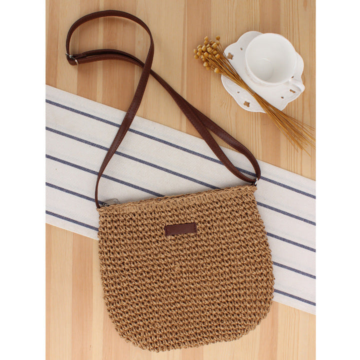 Textured woven shoulder bag for women in a natural beige hue. This fashionable handbag includes a removable crossbody strap.