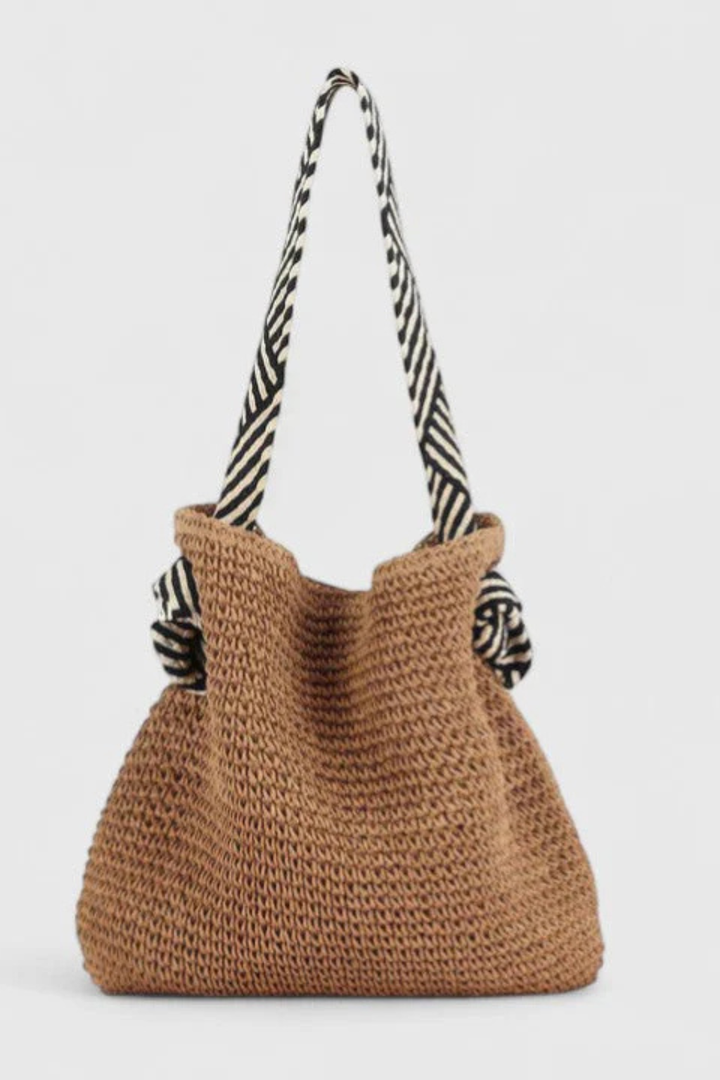 Casual women's straw woven tote bag, a summer essential with chic contrast shoulder straps.