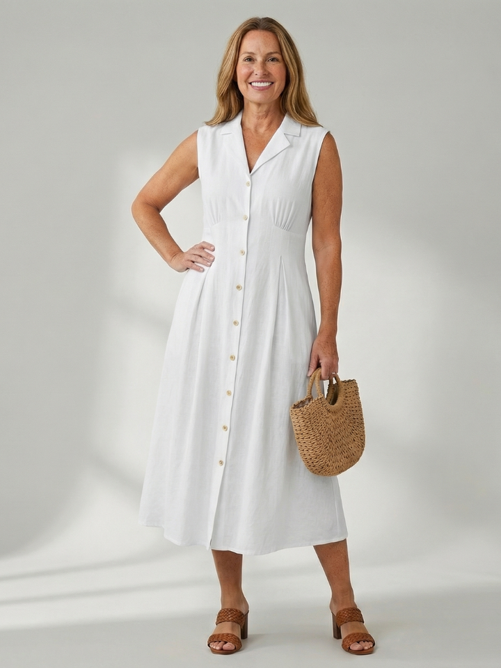 White sleeveless midi dress with stack buttons, everyday comfort & chic style.