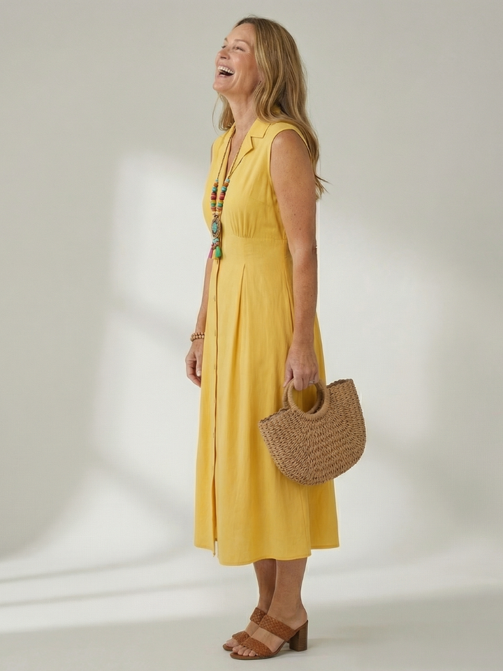 Chic black midi dress with stack button front, flattering and versatile for everyday fashion.