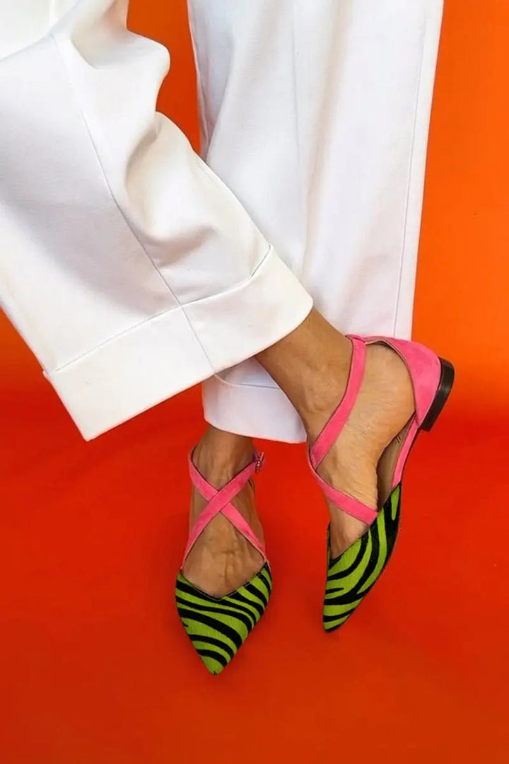 Unique women's zebra print pointed toe flats, featuring chic cross straps for comfortable, casual style.