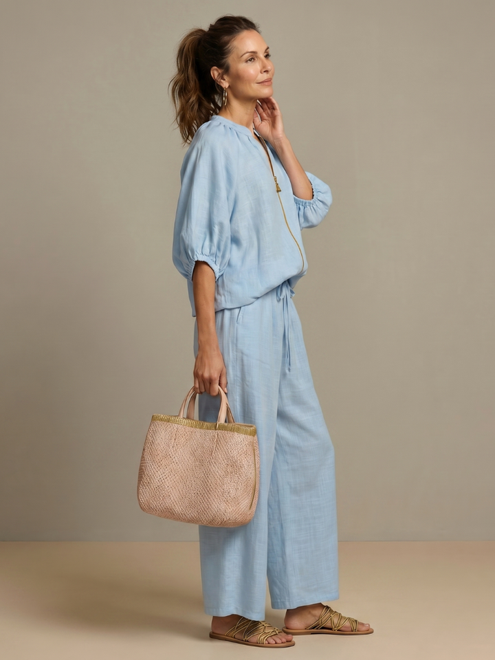 Stylish women's zip front blouson top with stand neckline & comfortable wide leg pants set.