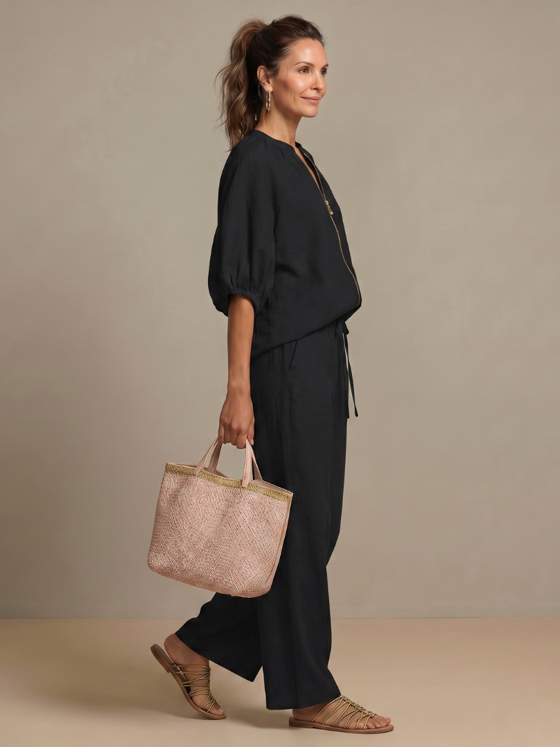 Women's comfortable zip front blouson top & wide leg pant set, perfect for relaxed movement.
