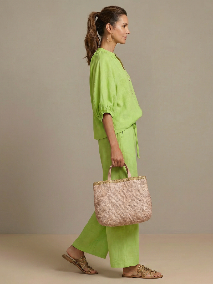 Soft fabric women's zip front blouson top & wide leg pant set, ideal for elegant comfort.