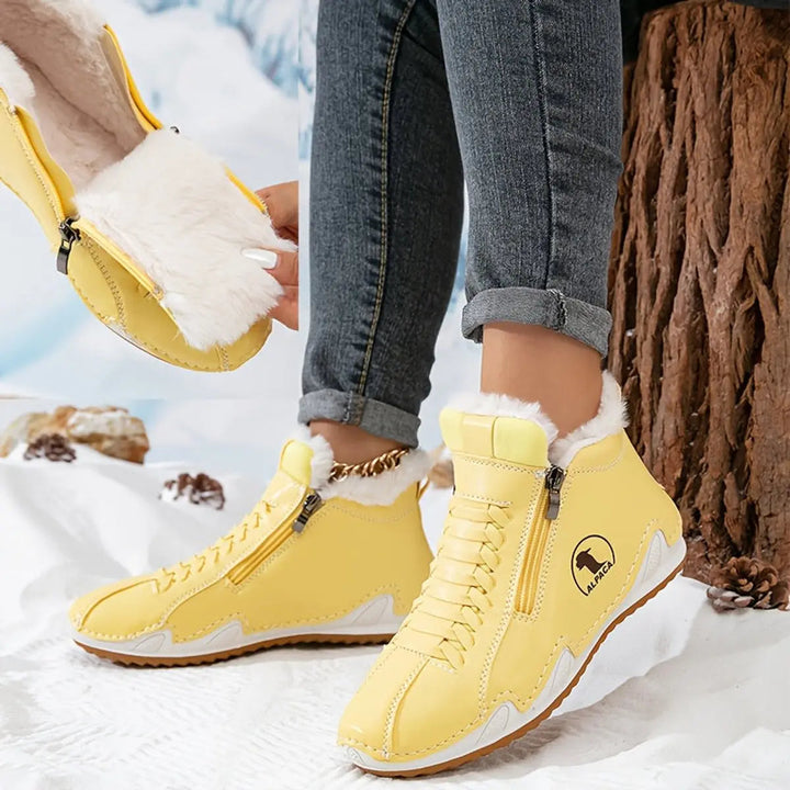 Cozy comfort women's winter boots, wide fit, zip-up for easy wear in snow conditions.
