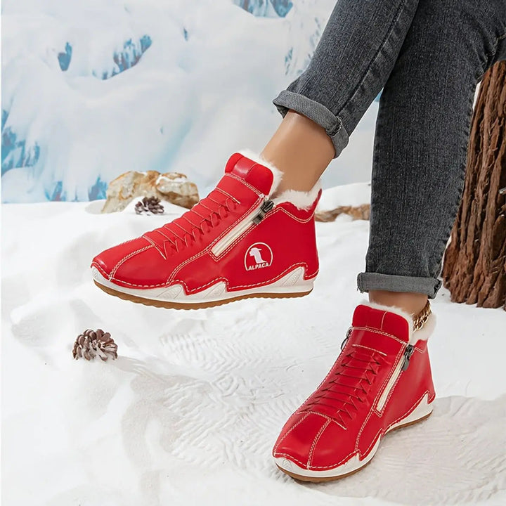 Durable women's ankle boots, faux-fur lined & wide fit for cold weather comfort.