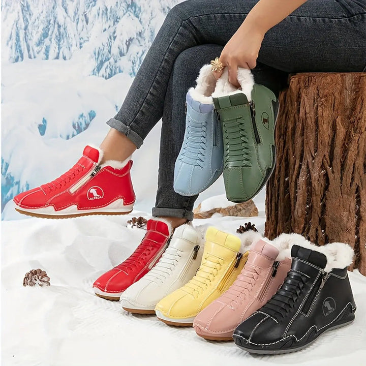 Stylish women's wide fit ankle boots, faux-fur lined, perfect for winter warmth & comfort.
