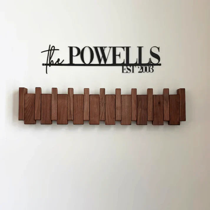 Stylish hat rack and coat hook with a musical piano theme