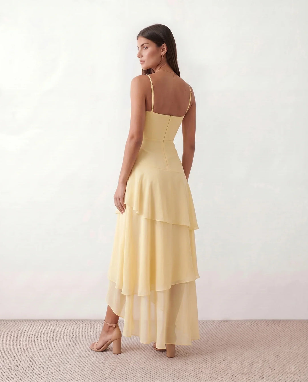 Women's yellow spaghetti strap maxi dress, Elsie model, with a flattering sweetheart neckline, casual or elegant.