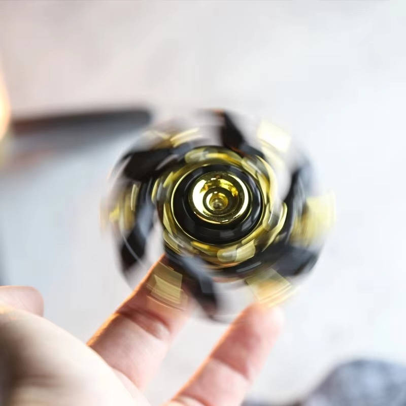 Smooth spinning metal fidget toy in zinc alloy, designed for adult relaxation.