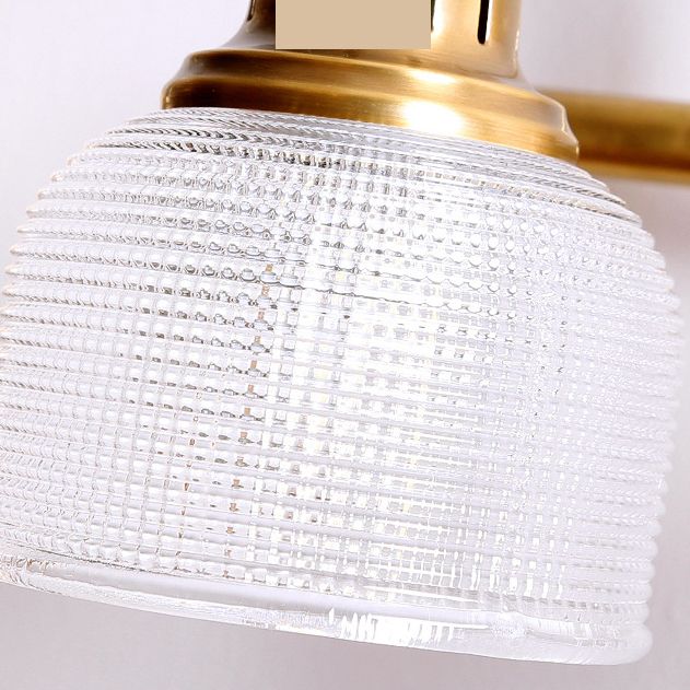 Zorlo elegant antique brass indoor wall light with glass shade, a modern classic home decor piece.