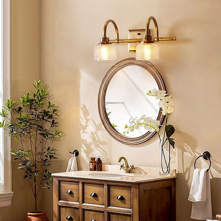 Elegant antique brass wall light, perfect modern classic decor for living room or bedroom.
